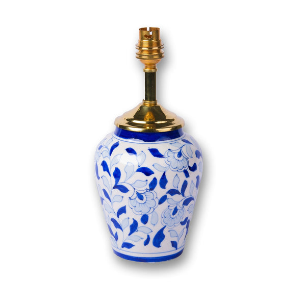 Artisan blue pottery lamp base with floral motifs for interior decoration